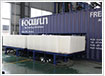 Containerized direct block ice machine