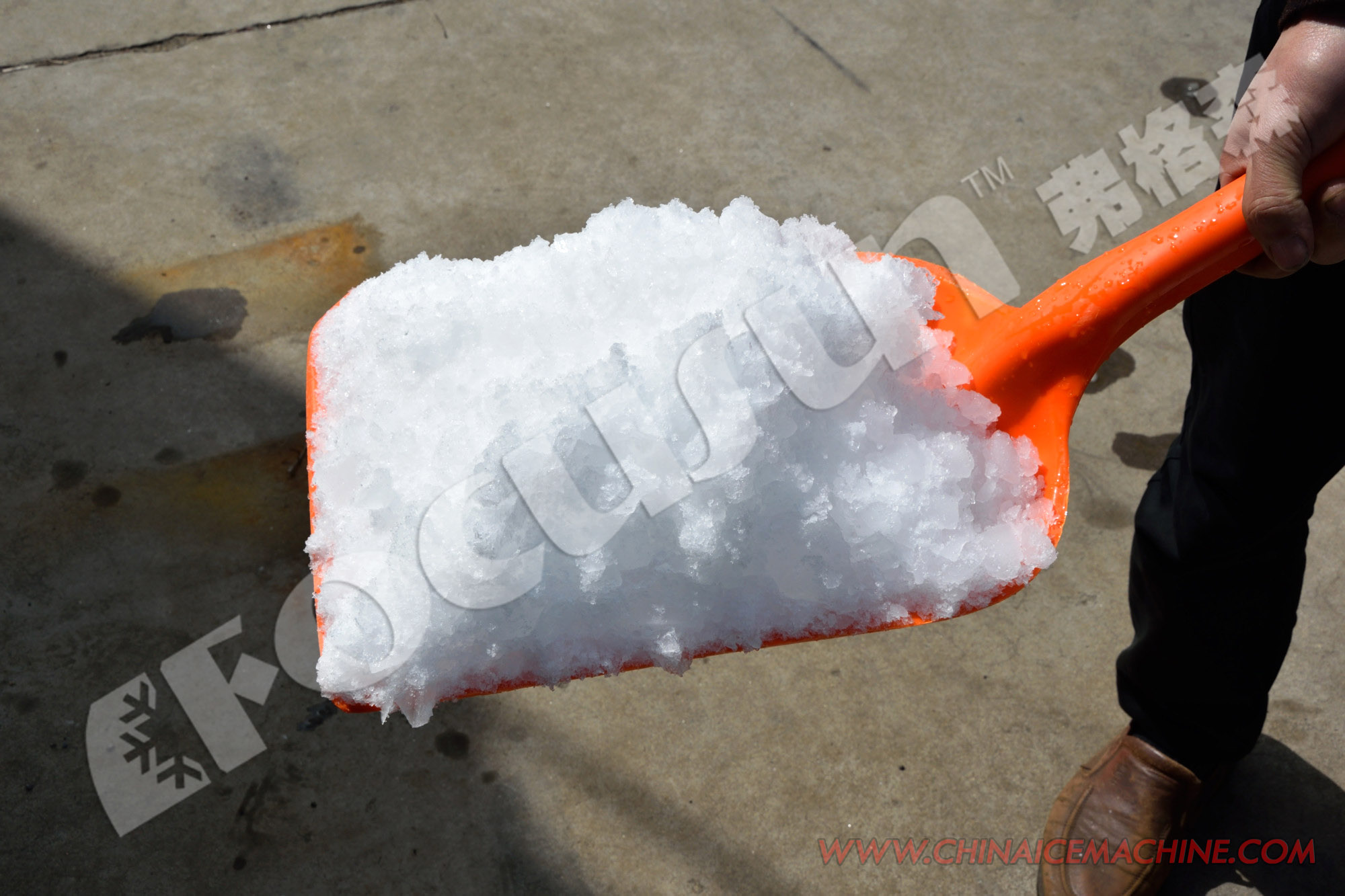 Industrial crushed ice ready for packaging, produced by Focusun ice crushing system, uniform and clean